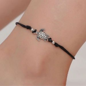Black cord anckle bracket with turtle